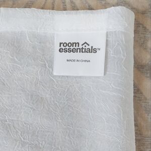 Room Essentials sheer crinkle textured curtain panel.